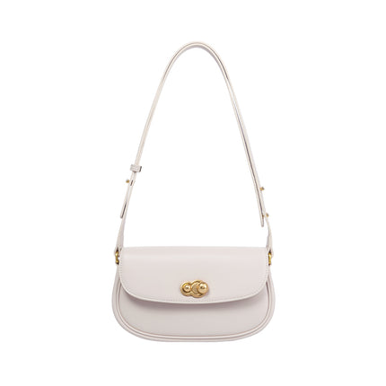 Sac à bandoulière carré en cuir de vache texturé