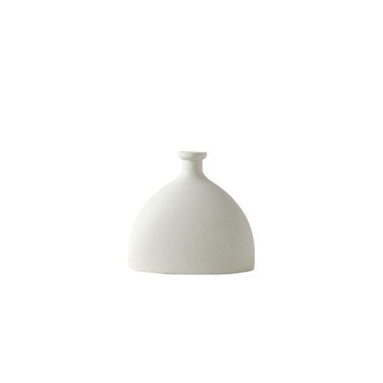 Multi-Shaped Ceramic Vase in White - wnkrs