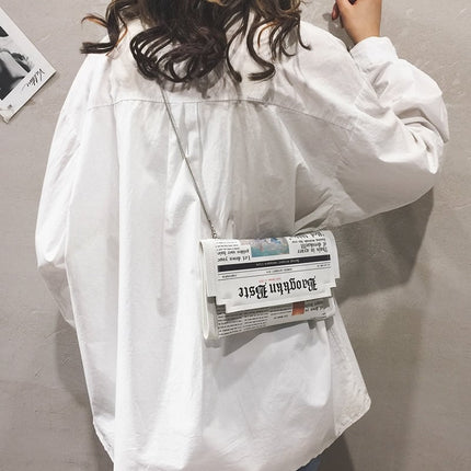 Women's Newspaper Design Clutch - Wnkrs