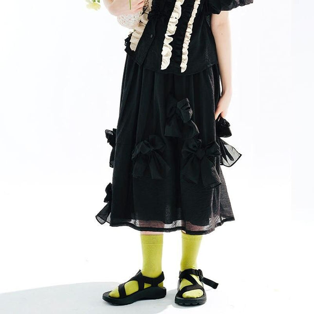 Falda midi elegante de corte A con lazo negro