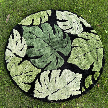 Tapis rond en peluche à motif de feuilles de Monstera vertes