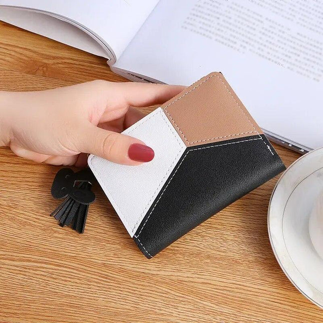 Minicartera elegante a cuadros con borla