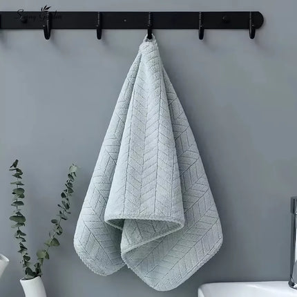 Serviette de bain et de visage en tissu éponge doux et absorbant