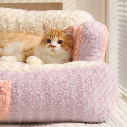 Acogedor sofá cama con forma de pastel de gato