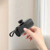 Enchufe Apple negro