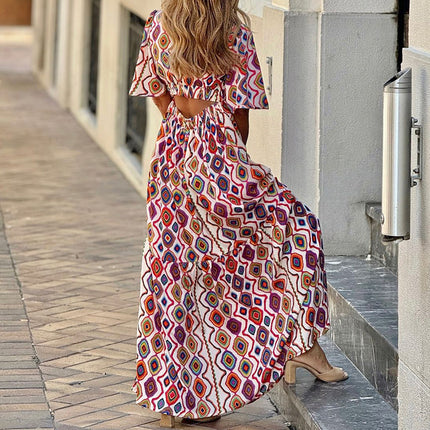 Vestido bohemio de largo medio con escote en V y estampado de moda