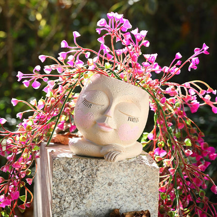 Pot de fleurs en résine avec trou de drainage et visage de fille fantaisiste