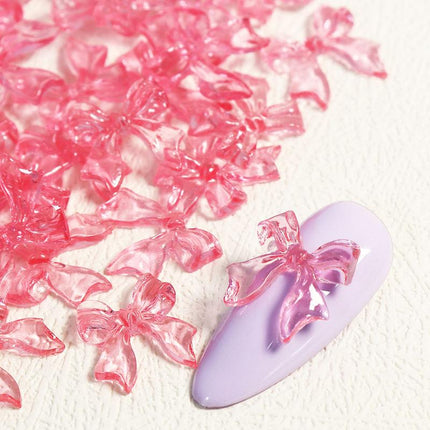 Charms pour ongles en forme de nœud rose bonbon