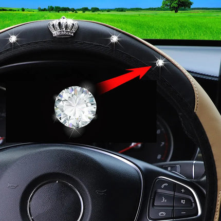 Cubierta del volante con corona de diamantes artificiales