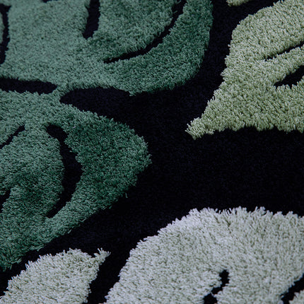 Tapis rond en peluche à motif de feuilles de Monstera vertes