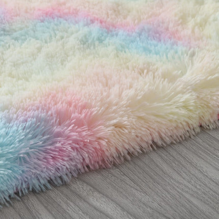 Alfombra de felpa con efecto tie-dye degradado para una decoración vibrante del hogar