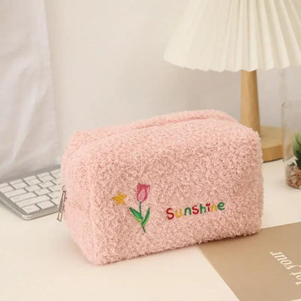 Bonita bolsa de cosméticos con flores bordadas