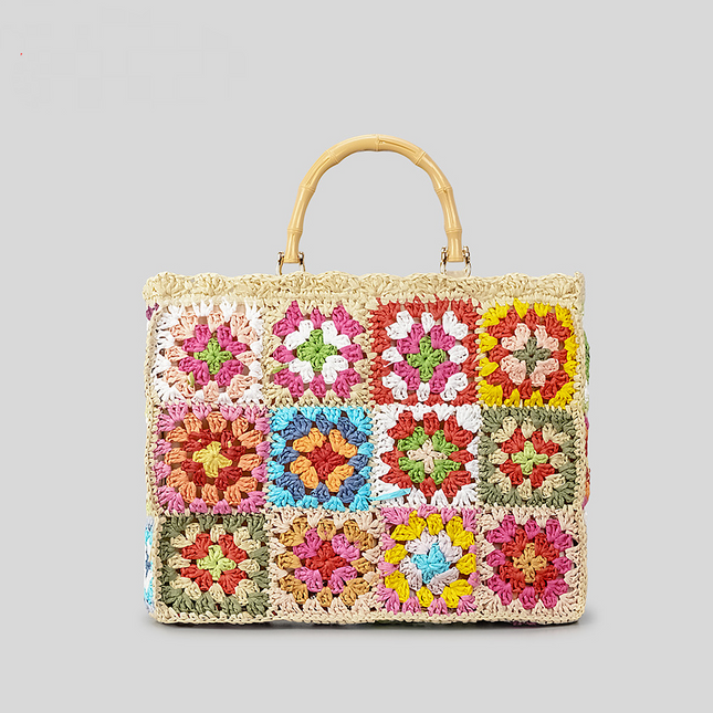 Bolso de mano bohemio con diseño floral y asas de bambú