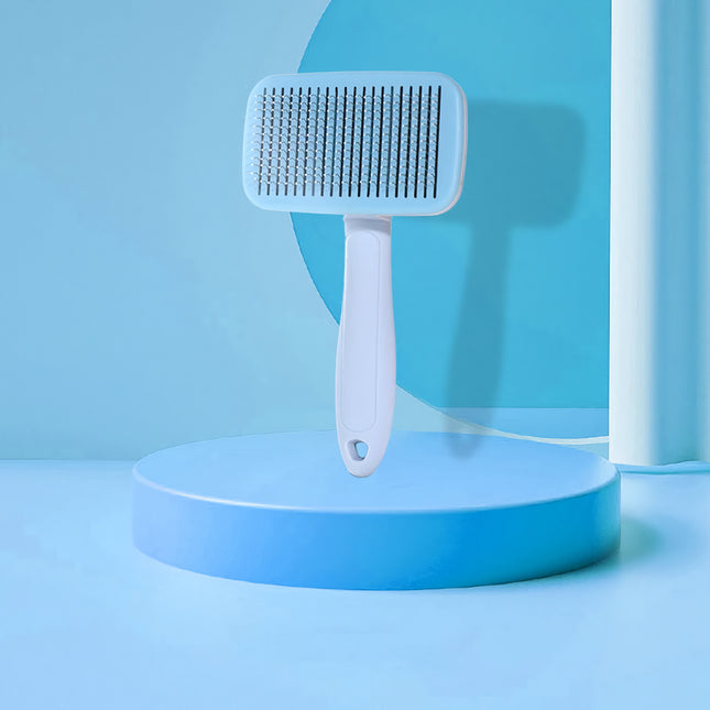 Brosse de toilettage autonettoyante pour chiens et chats