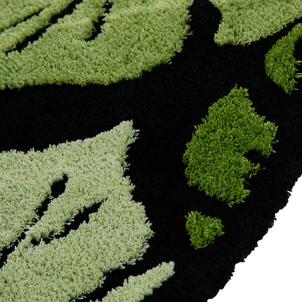 Tapis rond en peluche à motif de feuilles de Monstera vertes