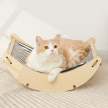 Cama mecedora de madera para gatos