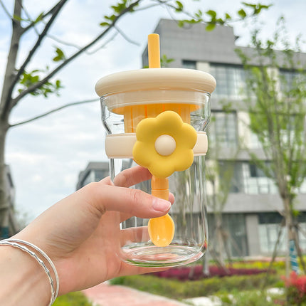 Vaso de cristal con forma de flor, tapa, pajita e infusor