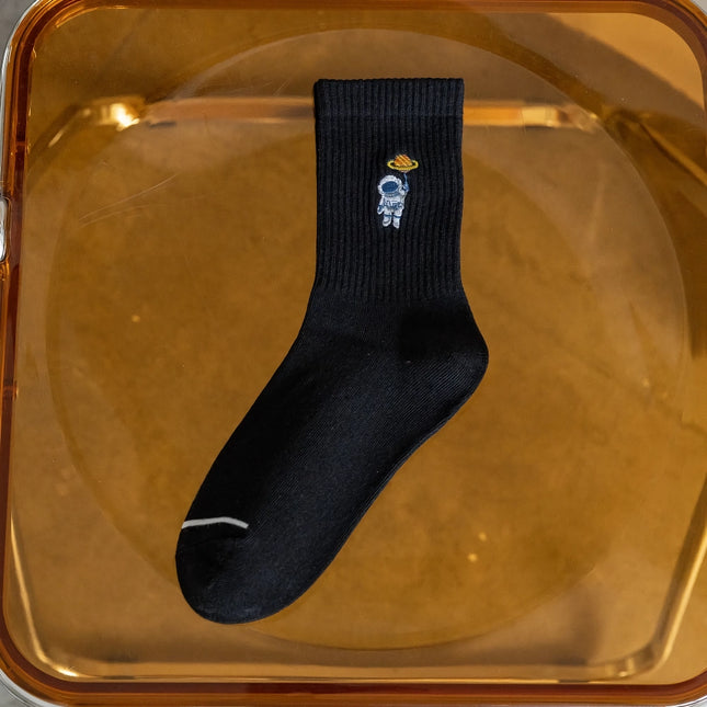 Chaussettes unisexes brodées représentant des astronautes