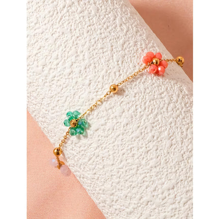 Pulsera de acero inoxidable con cuentas y flores de colores