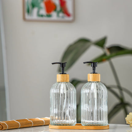 Elegante dispensador de jabón y loción de vidrio: artículos básicos para el baño