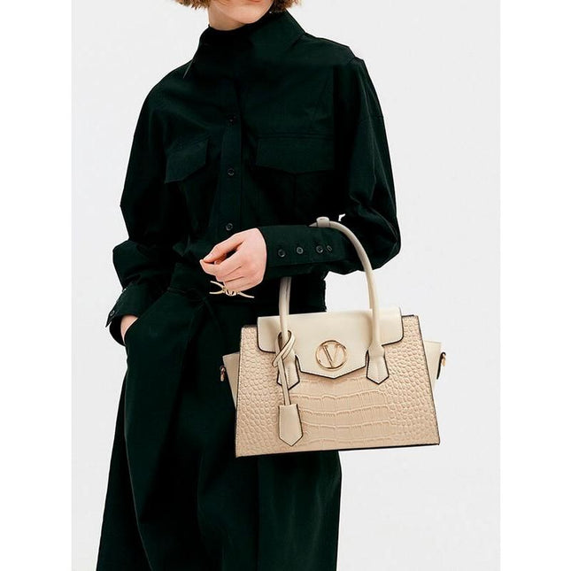 Elegante conjunto de bolso de mano y bandolera con estampado de cocodrilo y clutch