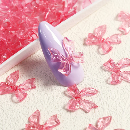 Charms pour ongles en forme de nœud rose bonbon