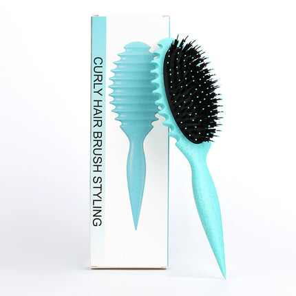 Brosse à cheveux démêlante en poils de sanglier pour définir les boucles