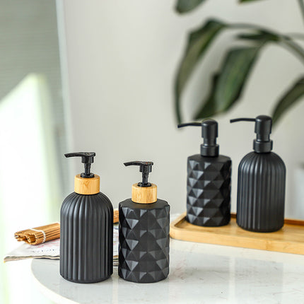 Elegante dispensador de jabón y loción de vidrio: artículos básicos para el baño