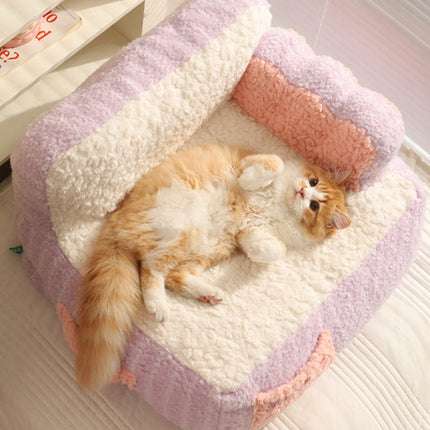 Acogedor sofá cama con forma de pastel de gato