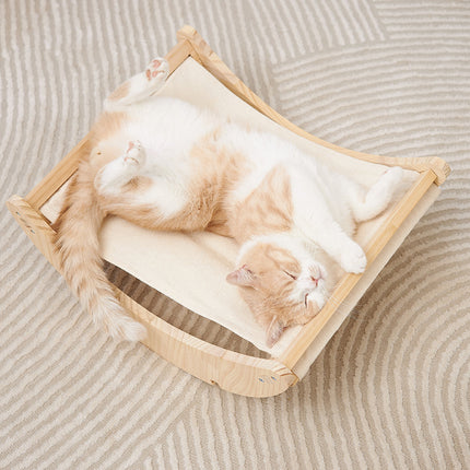 Cama mecedora de madera para gatos