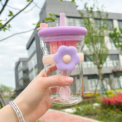 Vaso de cristal con forma de flor, tapa, pajita e infusor