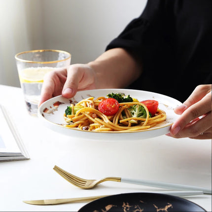 Platos de cena elegantes de cerámica nórdica con incrustaciones doradas