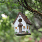 Cabane à oiseaux en chaume blanche