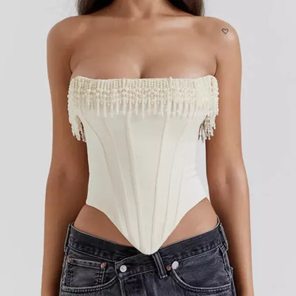 Haut corset chic sans bretelles avec pompons et perles