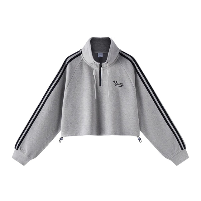 Sudadera gris con mangas raglán y punto gofre