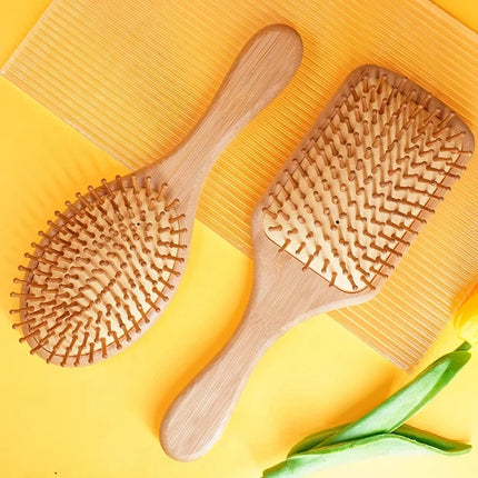 Cepillo para el cabello con cojín de madera de bambú