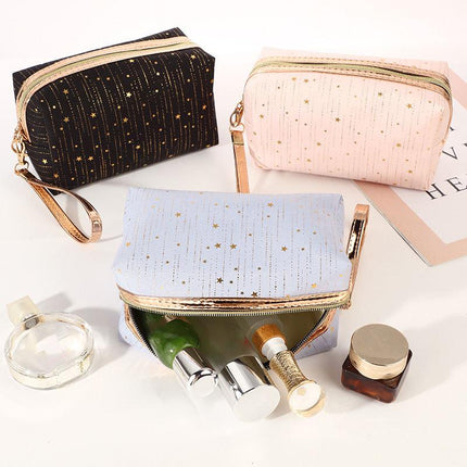 Elegante neceser y bolsa de cosméticos con estrellas brillantes para mujer