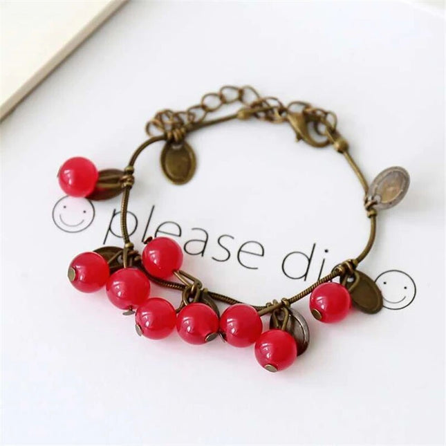 Brazalete bohemio vintage con monedas de cereza para niñas