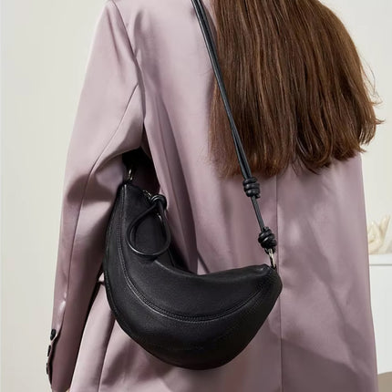 Bolso bandolera minimalista de piel suave