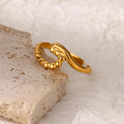 Anillo de onda dorado para mujer