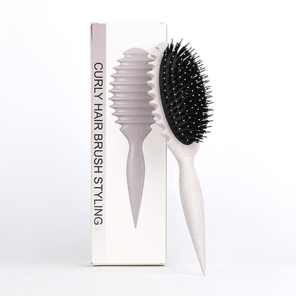 Brosse à cheveux démêlante en poils de sanglier pour définir les boucles