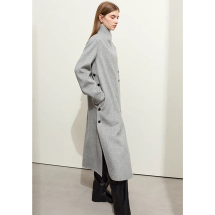 Manteau en laine minimaliste pour femme avec col montant et fente