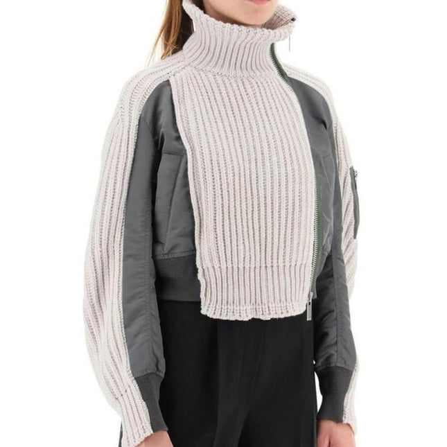 Chaqueta de invierno de mujer de punto acanalado moderno con cuello alto y detalle de cremallera