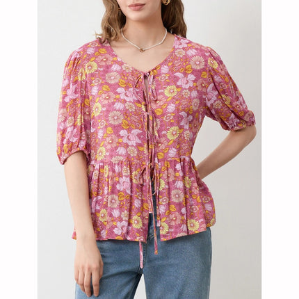 Blusa con escote en V y lazo con encaje floral