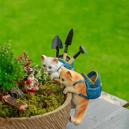 Estatua de jardín con forma de gato en forma de mochila