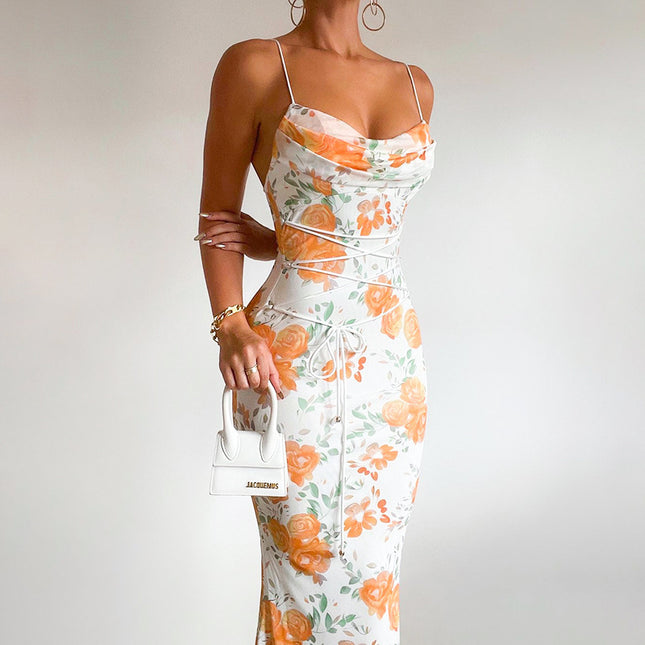 Vestido estampado con tirantes finos y cordones que recorta la cintura