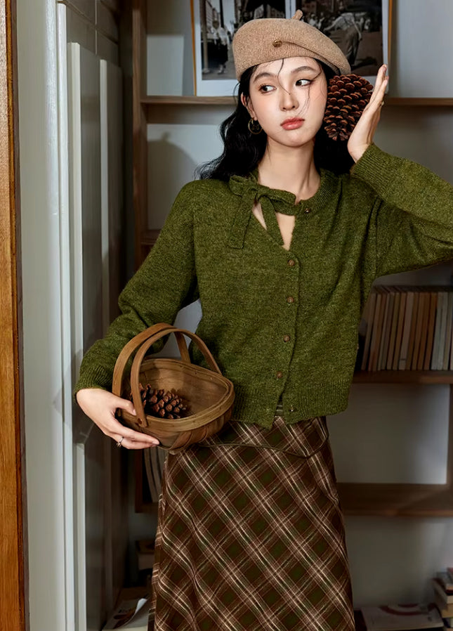 Cardigan en maille ajourée asymétrique