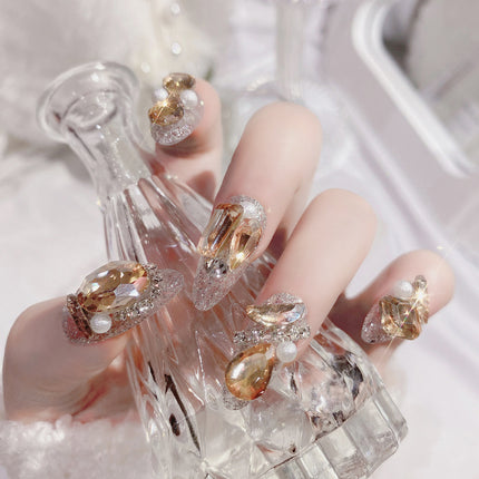 Faux ongles de luxe en cristal pailleté avec décor en strass doré