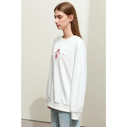 Pull brodé minimaliste pour femme