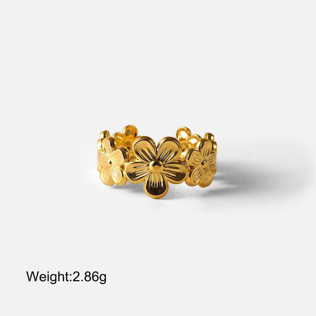 Anillo elegante ajustable con forma de flor en acero inoxidable bañado en oro de 18 quilates